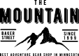 A blue icon of a weight with the word " tax " on it.
